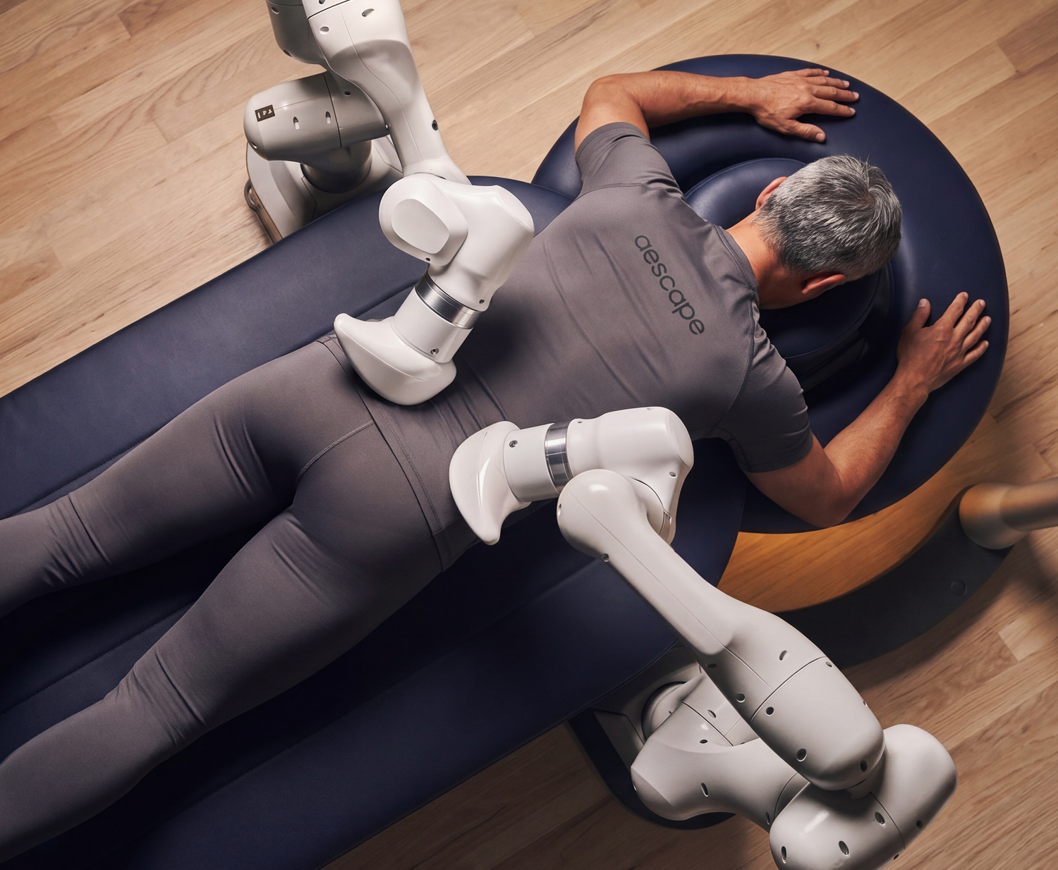 Aescape robotic massage table in a private wellness suite
